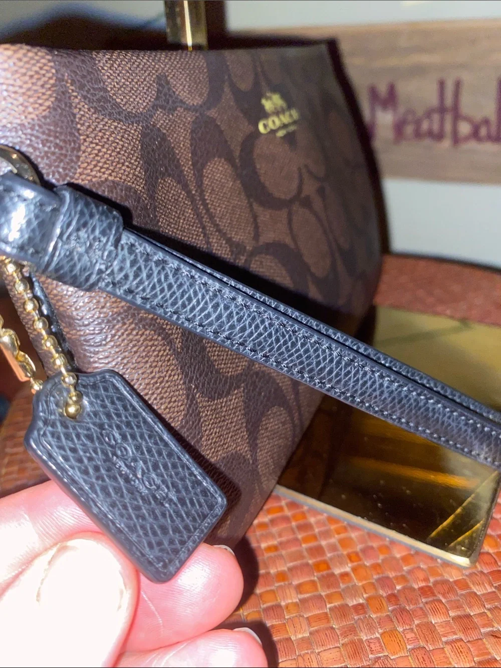 Coach Large Corner Zip Wristlet with signature brown canvas monogram